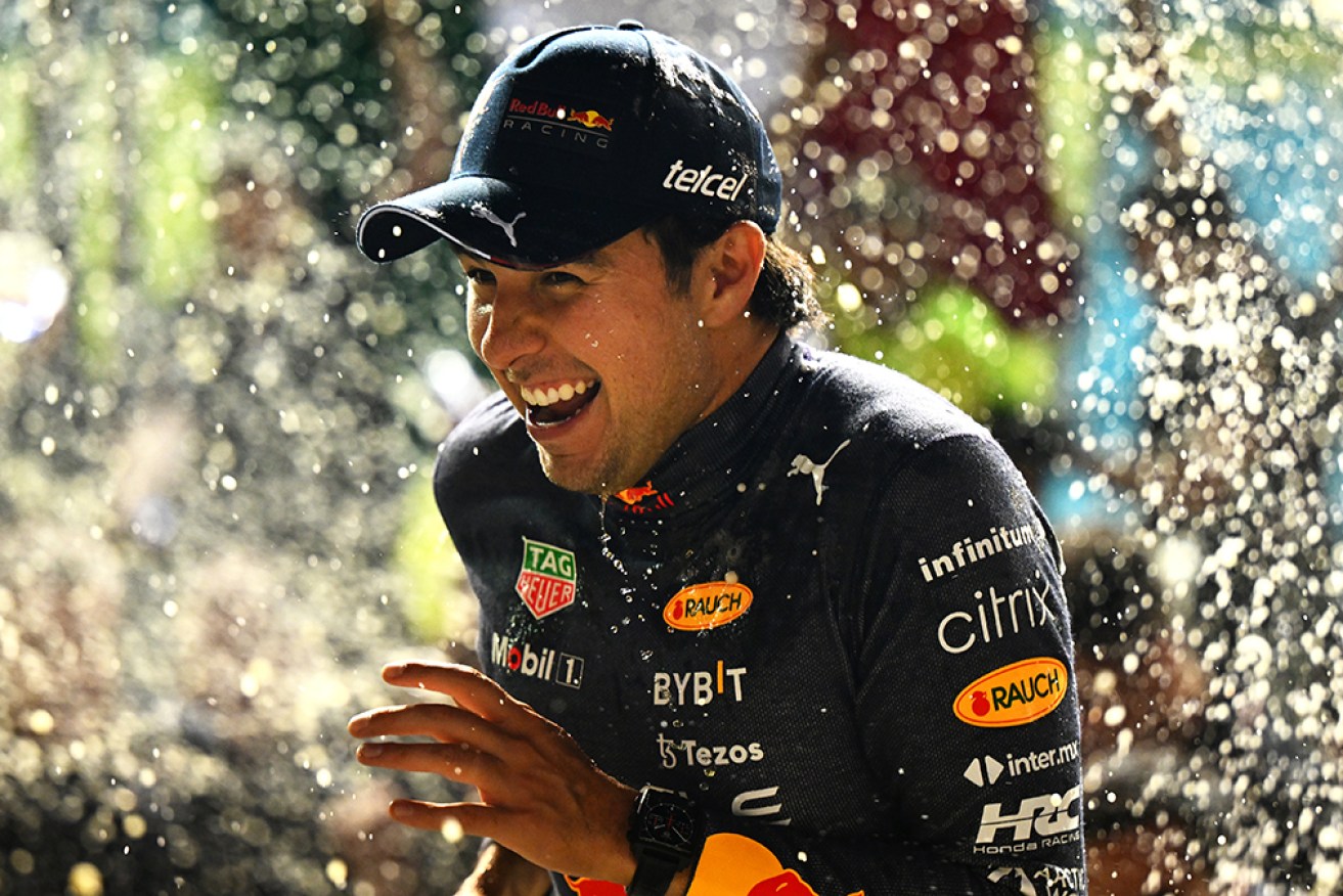 Red Bull driver Sergio Perez, pictured in Singapore, won the Azerbaijan Grand Prix on Sunday, beating Max Verstappen.