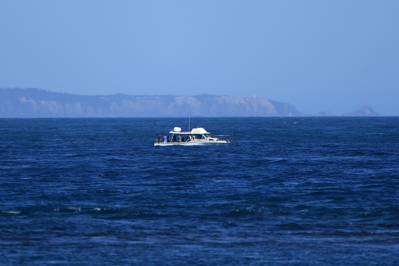 Two missing paddleboarders were last seen a kilometre out to sea.