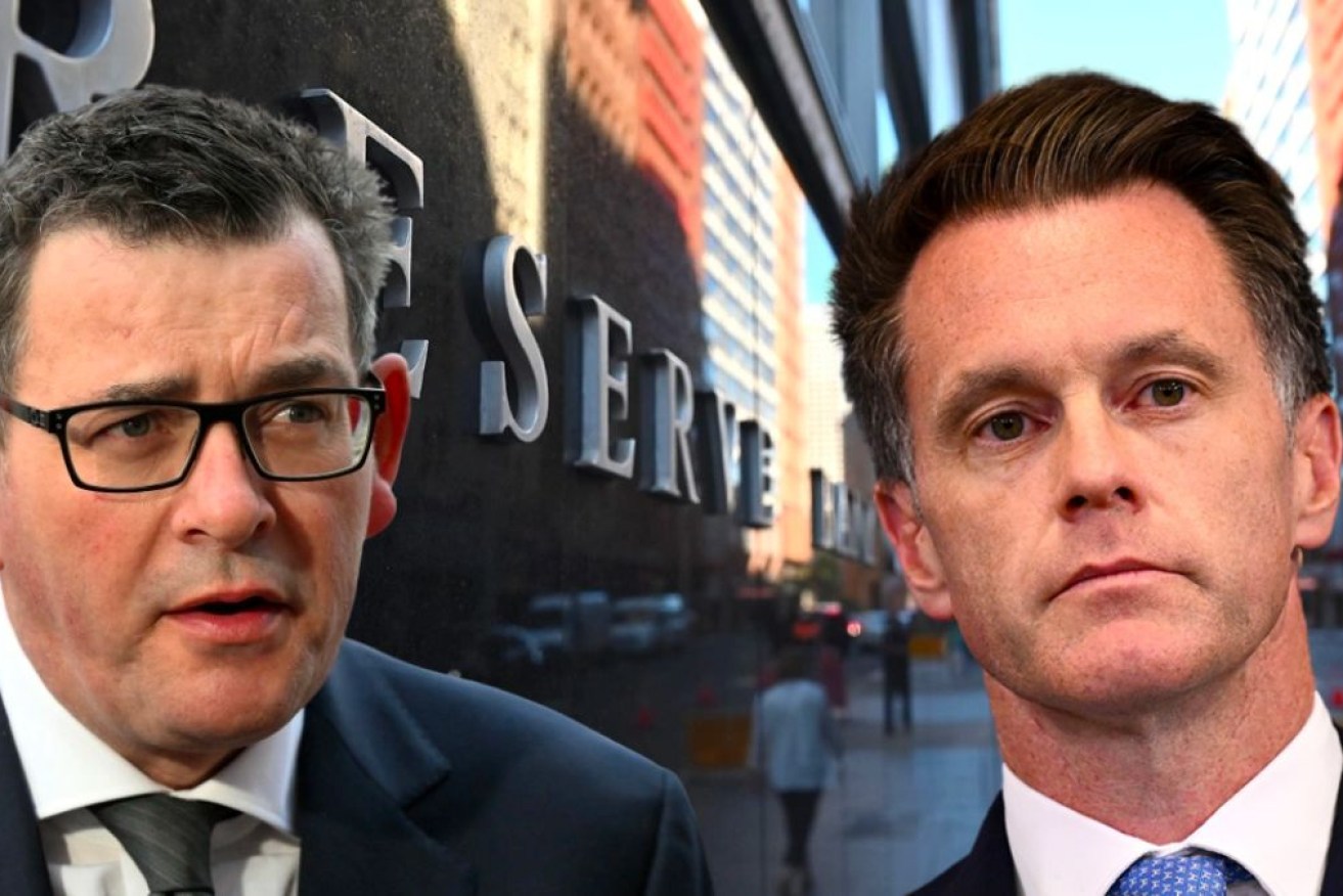 Daniel Andrews and Chris Minns have launched sprays at the RBA over interest rates.