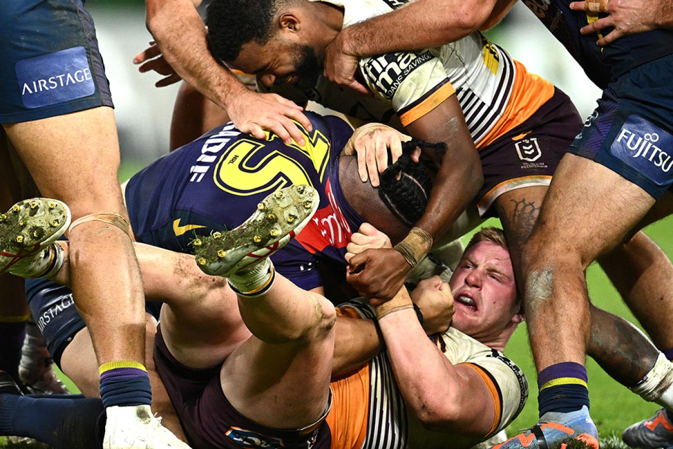 Melbourne overcame NRL ladder leaders Brisbane in an intense struggle at AAMI Park.