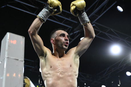 Third time plucky: Aussie Moloney claims world title