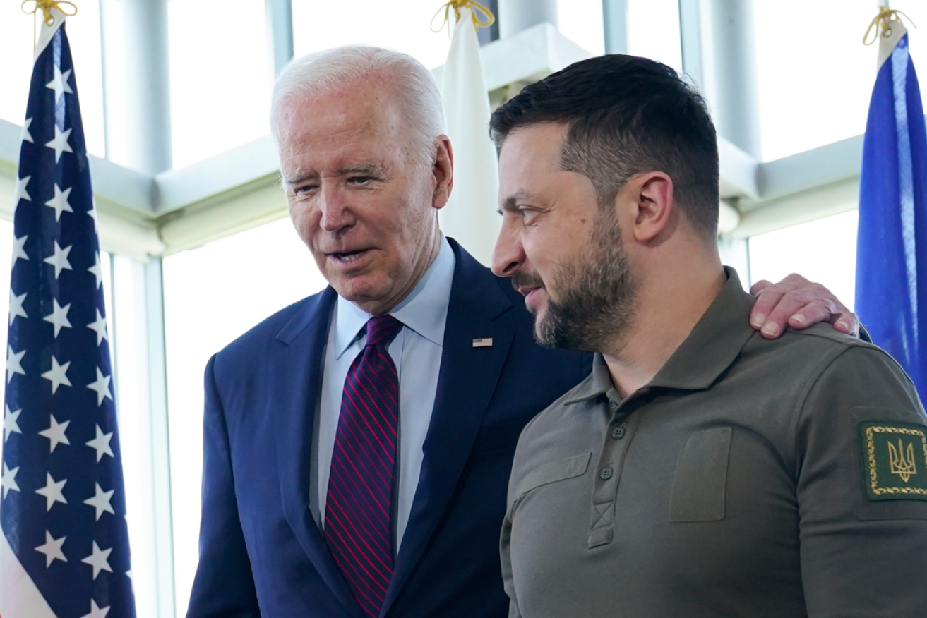 President Biden assures Volodymyr Zelenskiy at the G7 summit that Ukraine can count on US arms, money and support.
