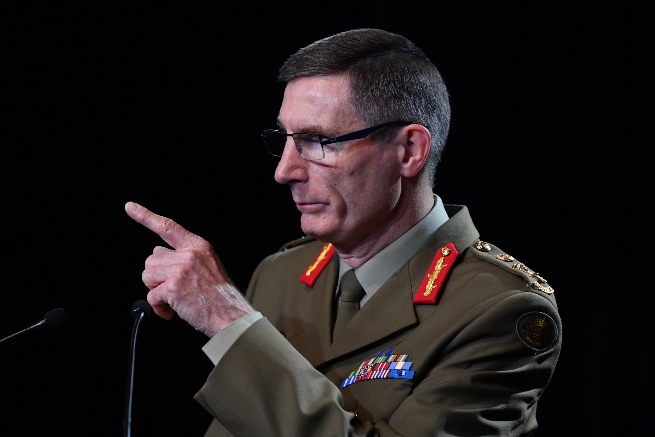 Chief of the Australian Defence Force (ADF) General Angus Campbell delivers the findings from the Inspector-General of the Australian Defence Force Afghanistan Inquiry, in Canberra, Thursday, November 19, 2020. A landmark report has shed light on alleged war crimes by Australian troops serving in Afghanistan. (AAP Image/Mick Tsikas) NO ARCHIVING