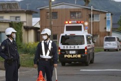 Siege under way in Japan after three killed 