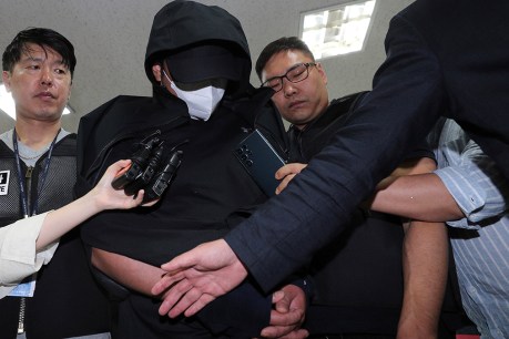 South Korean arrested for opening plane door