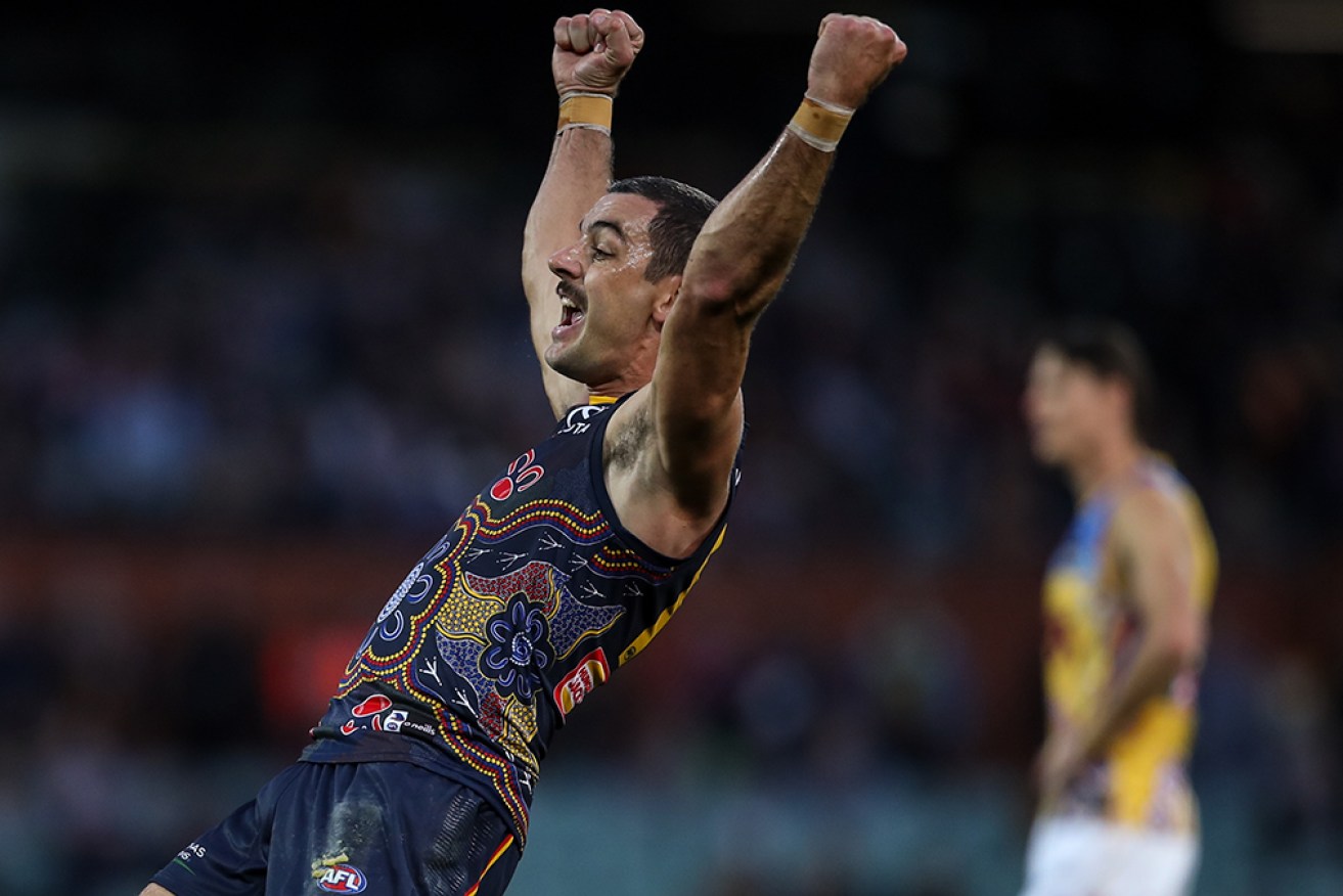 Taylor Walker's three goals helped Adelaide to a superb 17-point win over Brisbane at Adelaide Oval on Sunday. 