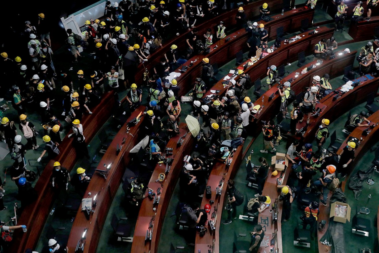 Thirteen people were put on trial over the 2019 protest inside Hong Kong's Legislative Council.