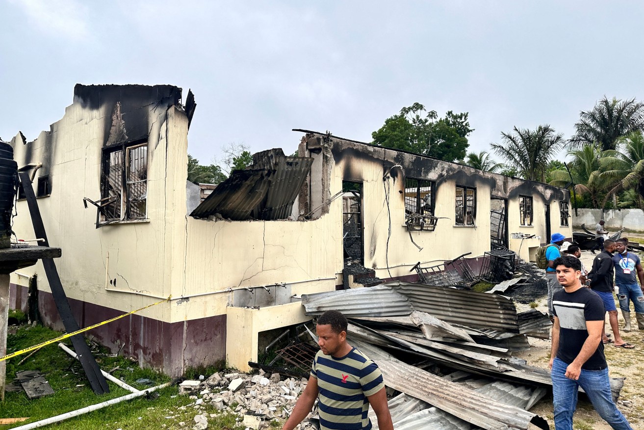 A teen faces murder charges after she allegedly set her dorm alight when her phone was confiscated.
