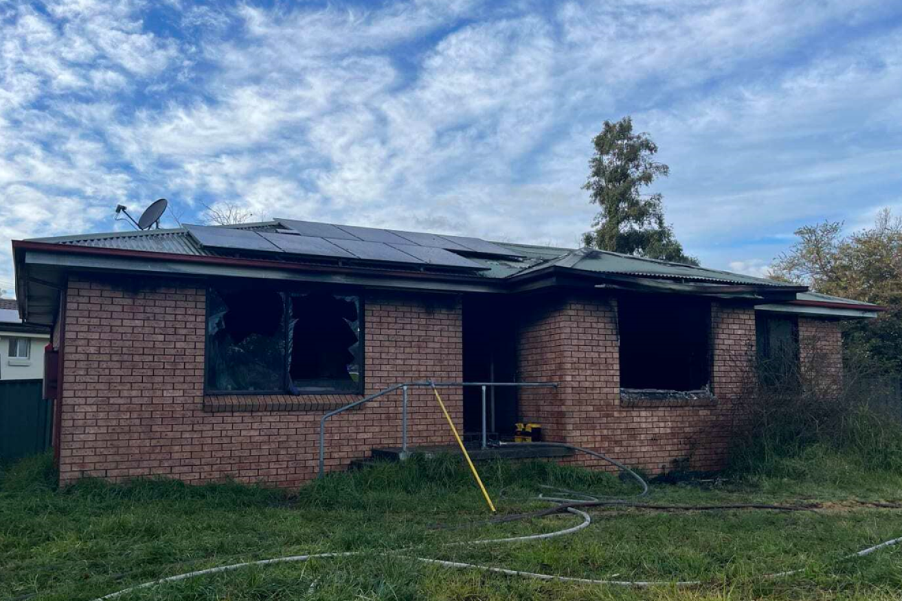 This burned-out shell is all that remains of the family home.