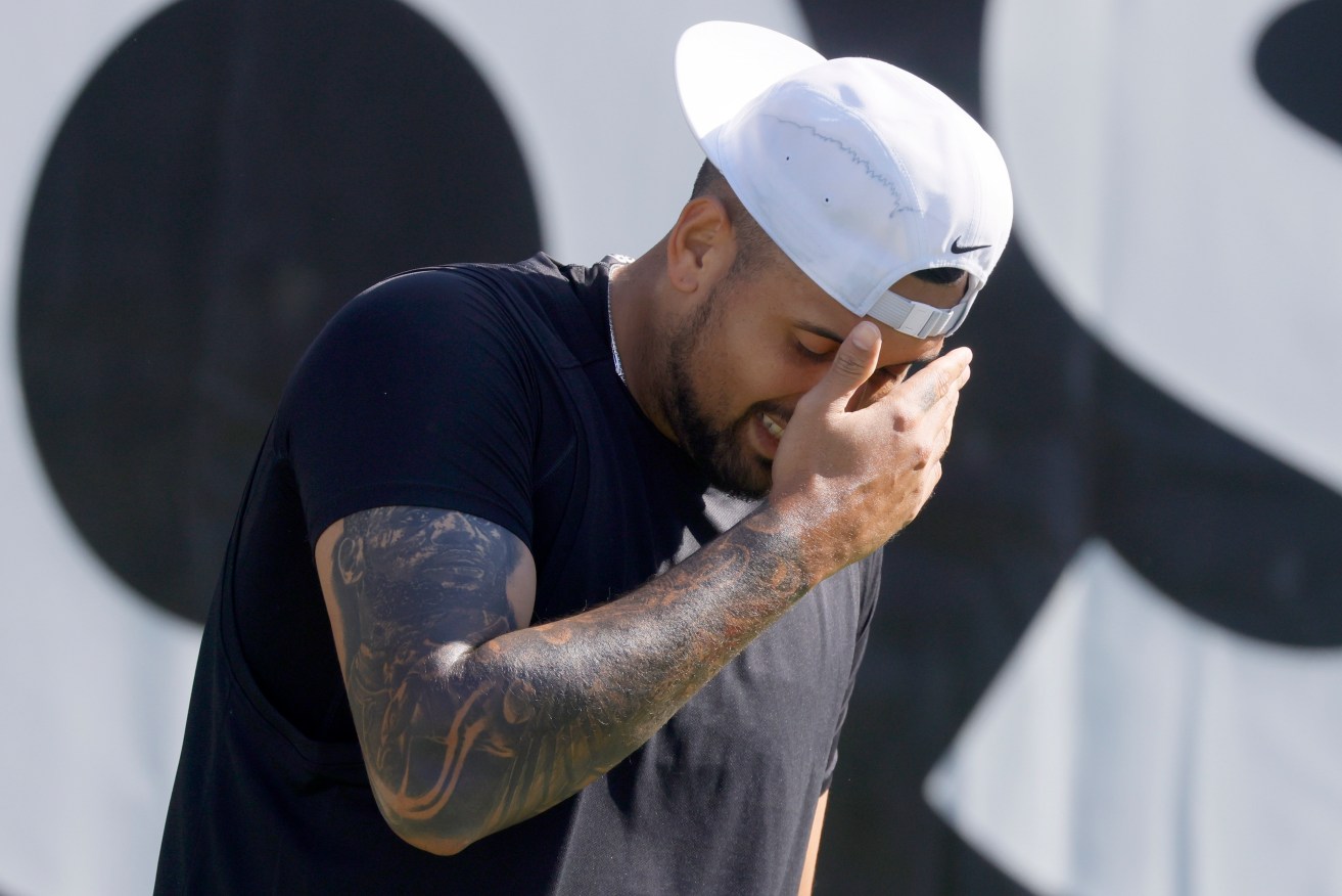 Nick Kyrgios has struggled with knee pain during his comeback-match defeat to China's Yibing Wu.