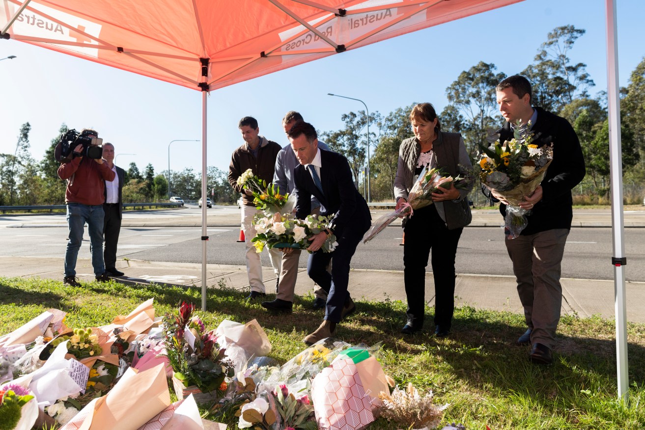 NSW Premier Chris Minns laid a wreath and announced a $100,000 donation to a survivors' fund.