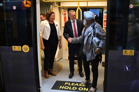 PM boards campaign train for Fadden byelection