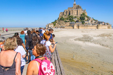 France acts as tourists reach plague proportions
