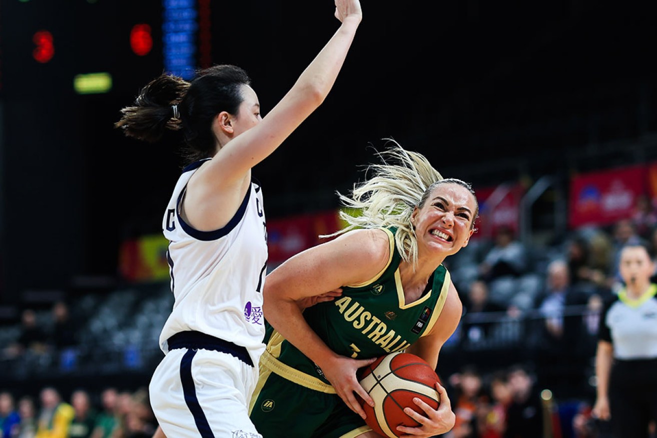 Captain Tess Madgen drives to the basket in Australia's 91-45 Asia Cup Group B win over Taiwan.