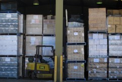 Woolworths worker dies after pallet stack collapse
