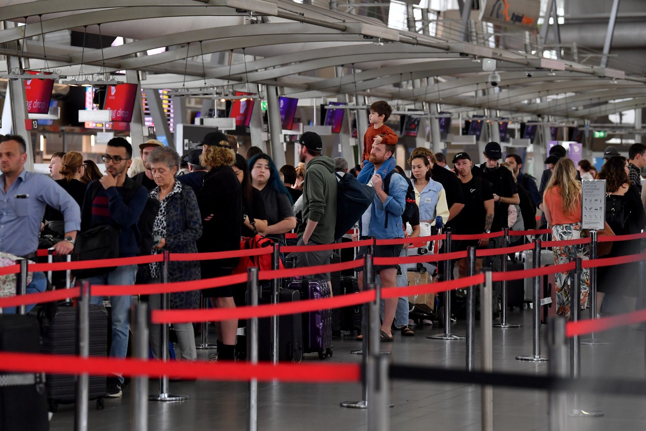 A system outage at international airport check-in points across the nation has been fixed.