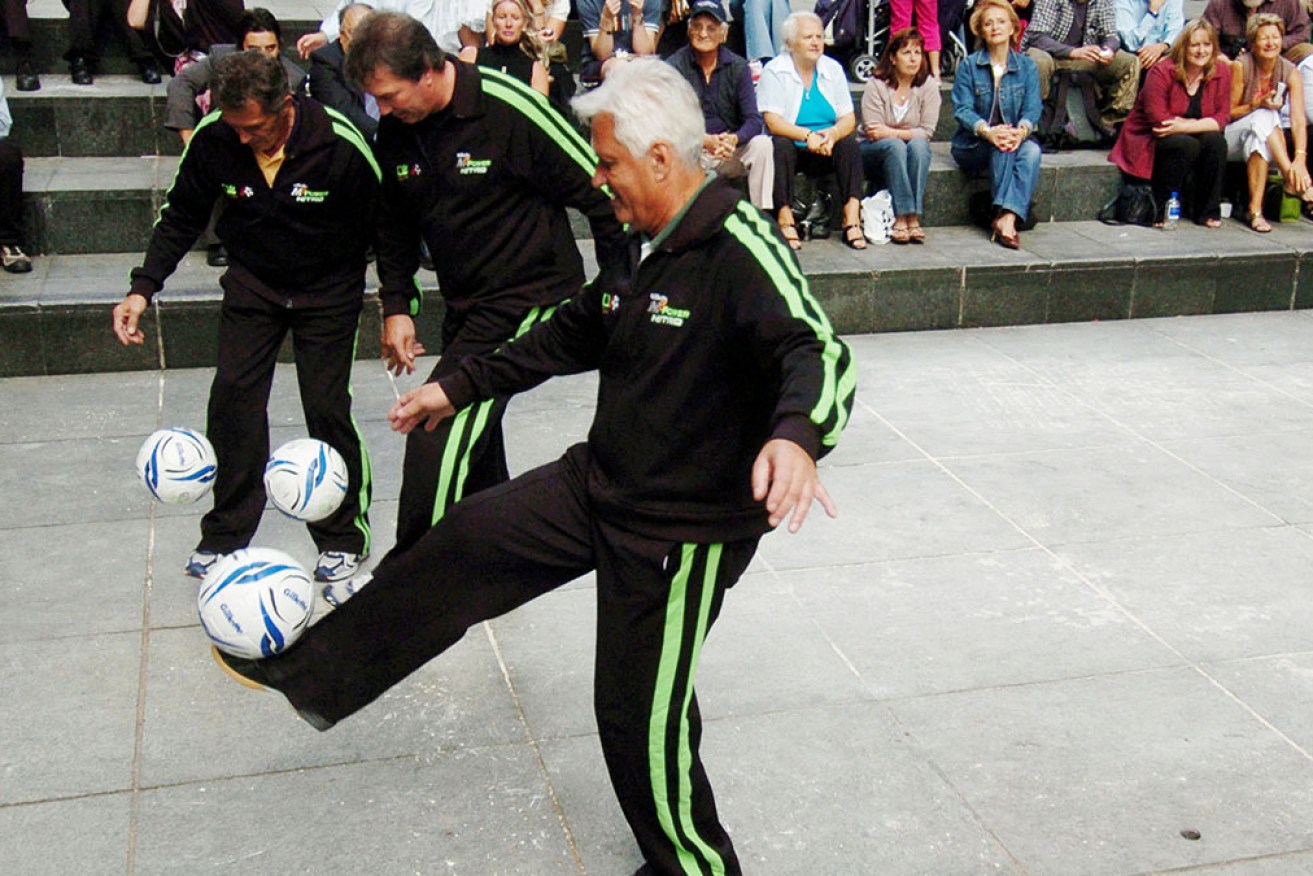 Attila Abonyi (far left), with fellow 1974 Socceroo Adrian Alston and coach Rale Rasic in 2006, has died. 