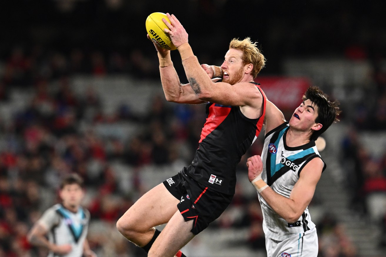 Essendon's Andrew Phillips could face a suspension after a high bump against Adelaide on Sunday.