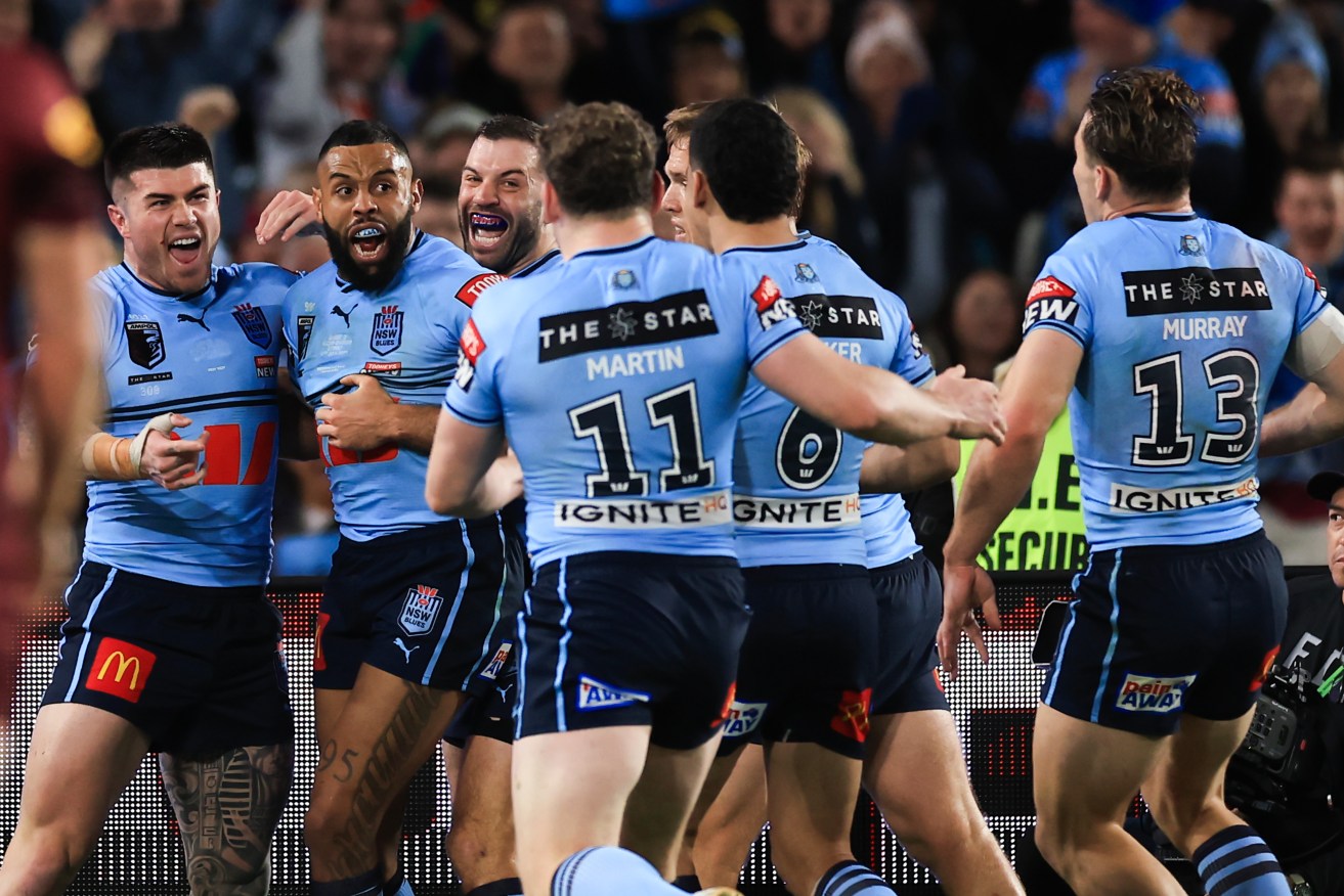 Josh Addo-Carr of the Blues celebrates a try with team mates during Game 3 of the 2023 State of Origin series.