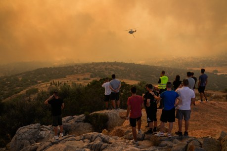 Homes destroyed as Greece wildfires rage into the night
