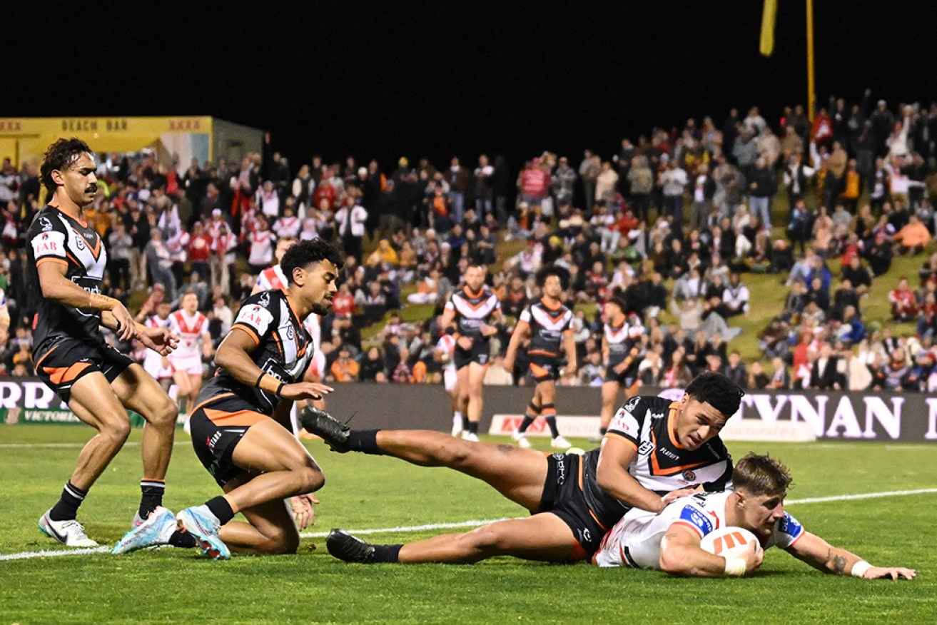 Zac Lomax scores in St George Illawarra's win over Wests Tigers.