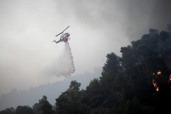Rhodes still ablaze as more fires rage in Greece