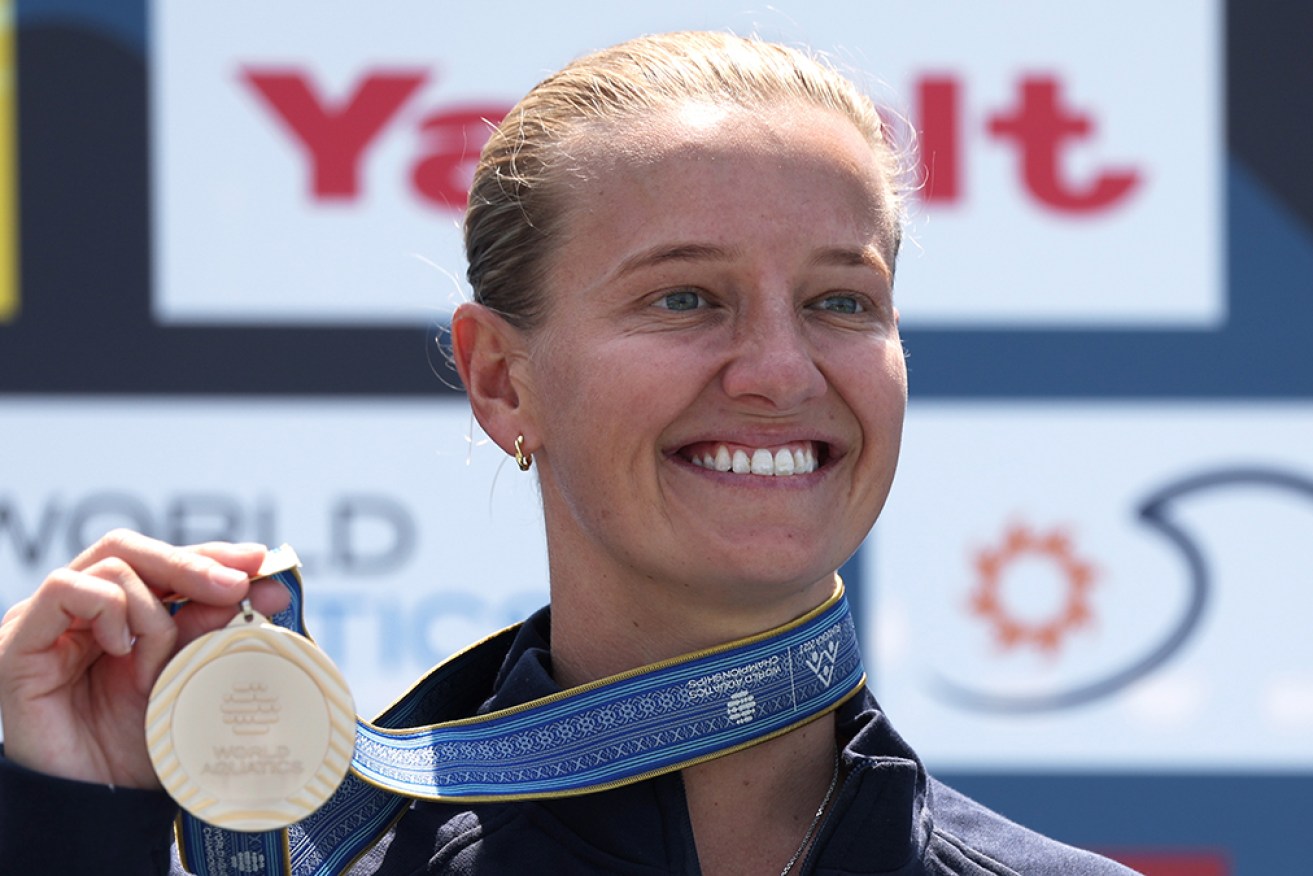 Australia's Rhiannan Iffland with her high diving gold medal at the world championships in Japan.