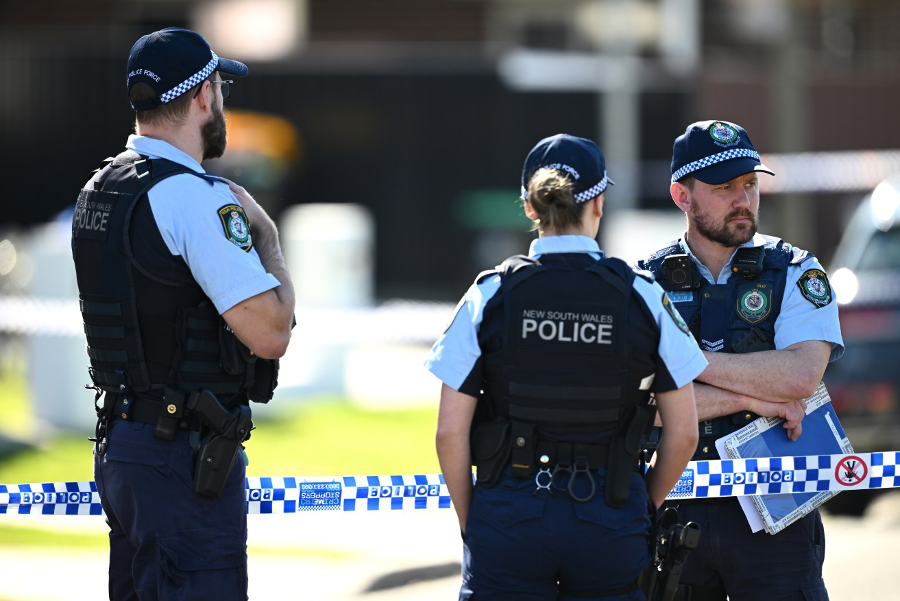 Police at the scene in Greenacre, where lawyer Mahmoud Abbas was shot on Wednesday.