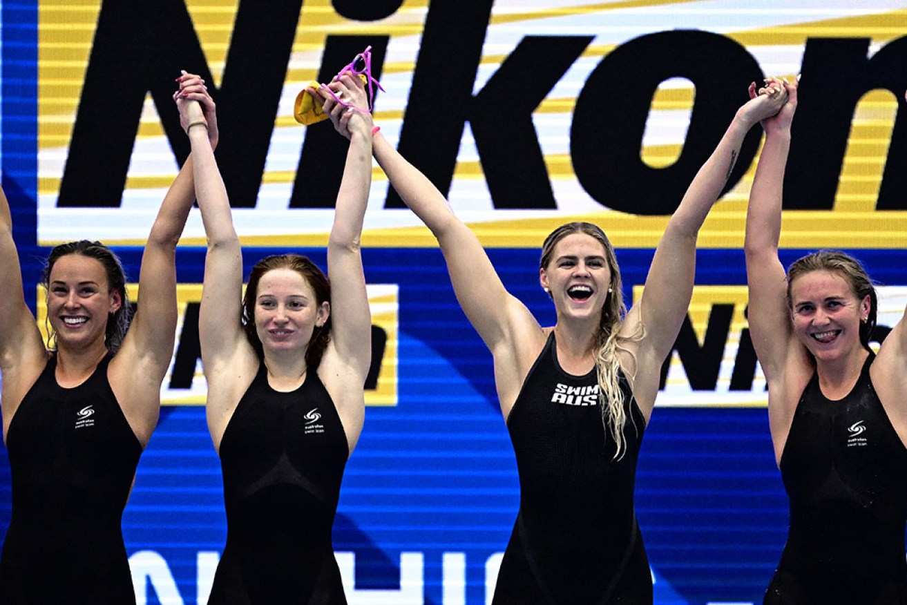Brianna Throssell, Mollie O'Callaghan, Shayna Jack and Ariarne Titmus celebrate their gold and world record.
