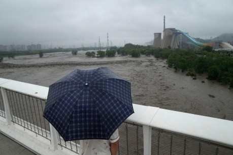 Extreme rain turns roads to rivers in Beijing
