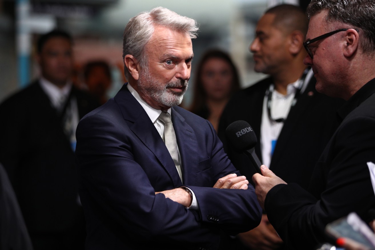 Actor Sam Neill has warned his fans after being impersonated by scammers on social media.