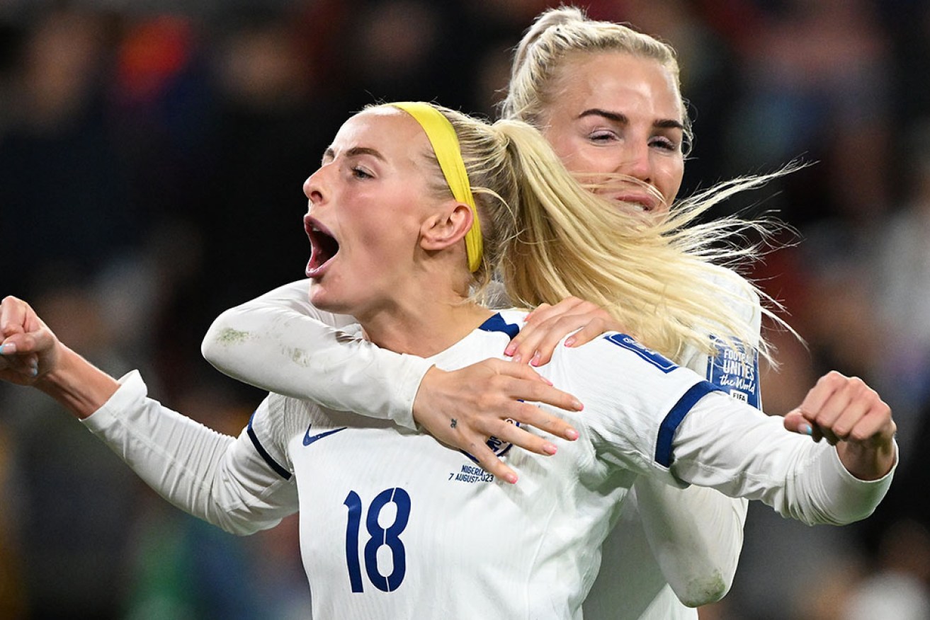 England’s Chloe Kelly celebrates after her penalty seals victory in the shootout against Nigeria in Brisbane on Monday night.