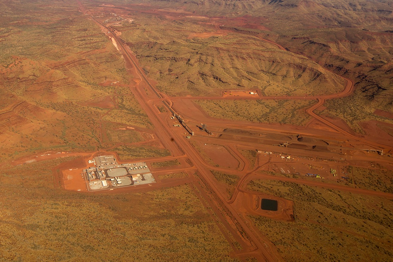 Andrew Forrest's Fortescue says hundreds of jobs are being cut because it "must continually evolve".