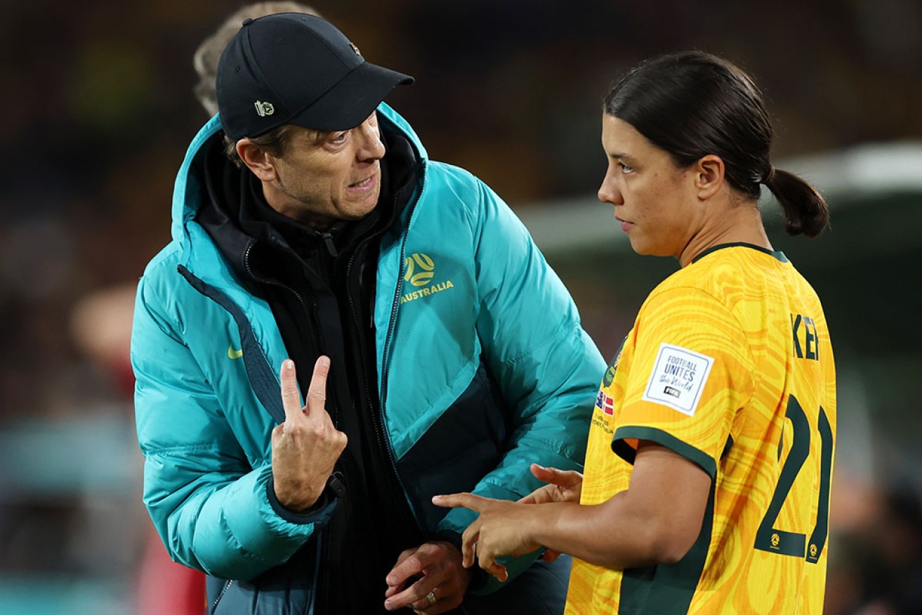 Coach Tony Gustavsson and Matilda's captain Sam Kerr plot their strategy.