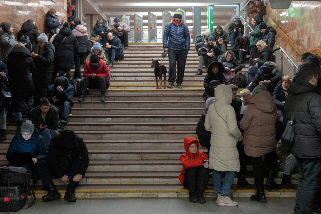 Kyiv residents take shelter in a subway station as Russian missiles pound the city.