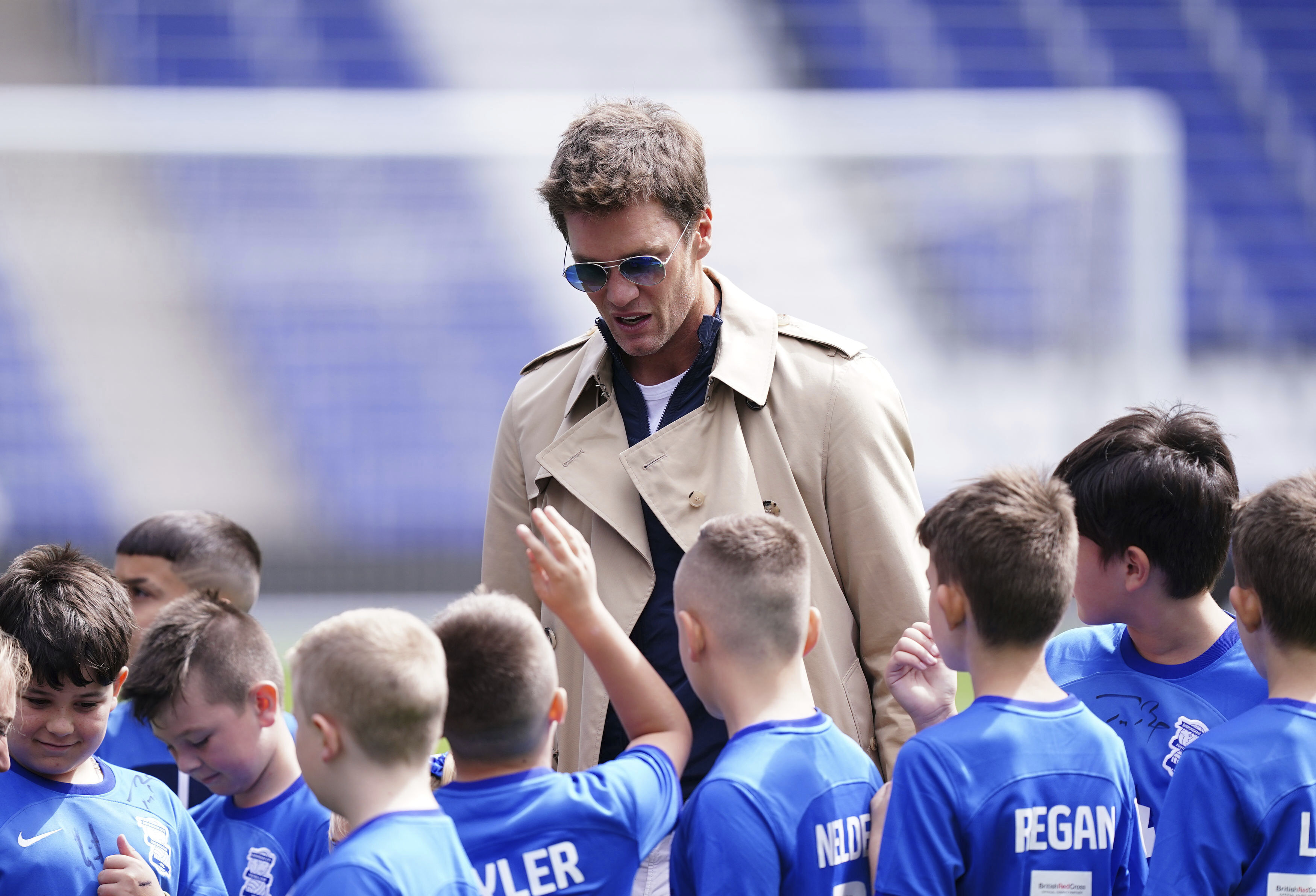 Tom Brady meets fans of his new English club at the pub