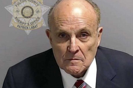 Giuliani surrenders in Trump election case