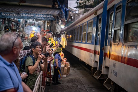 Tourists won't stay away from Hanoi's Train Street