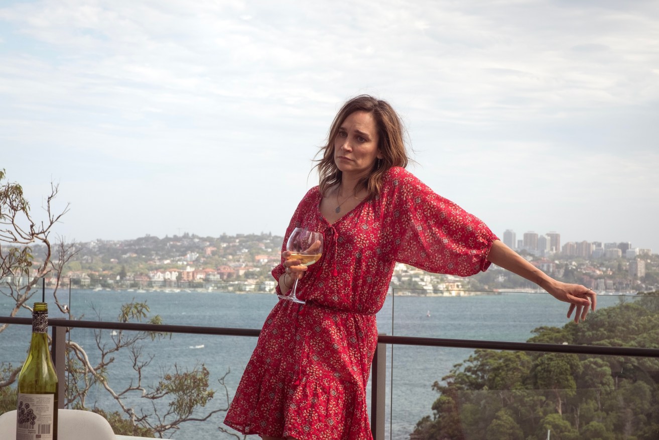 Nicole da Silva in a scene from <I>One Night</I>, against the backdrop of Sydney Harbour.
