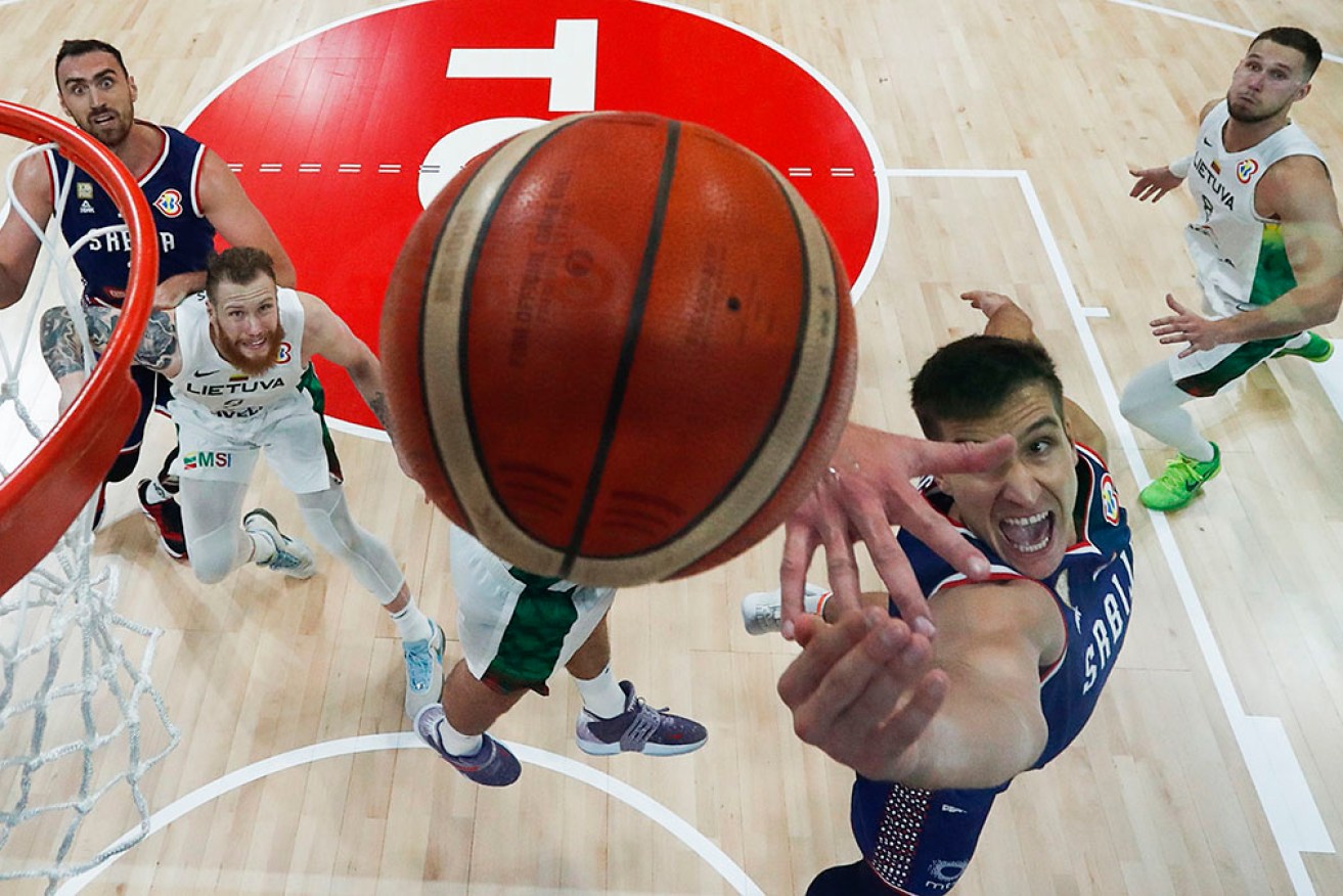 Serbia's Bogdan Bogdanovic drives to the basket in their Basketball World Cup win over Lithuania. 