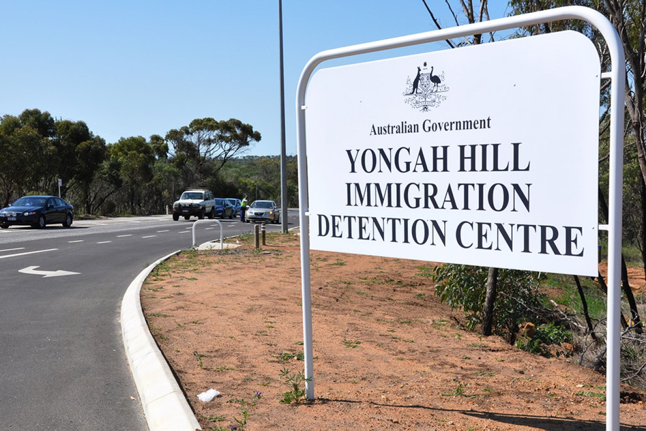 An Iranian asylum seeker remains in Yongah Hill Detention Centre despite a High Court victory. 