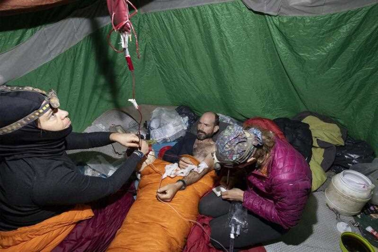 A medical team takes care of American Mark Dickey inside the Morca cave near Anamur, southern Turkey.