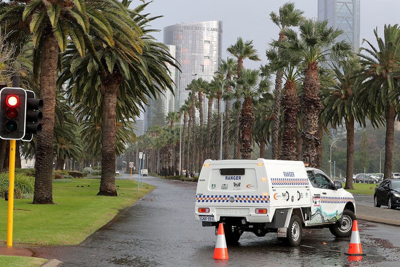 Perth residents are warned to seek shelter away from trees, powerlines and storm water drains.