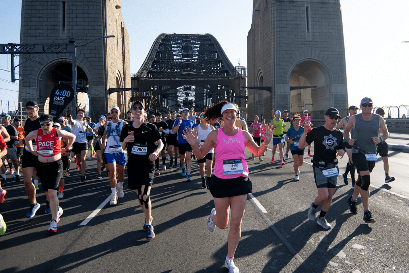 Marathoners still had the energy to smile as crossed the Harbour Bridge.