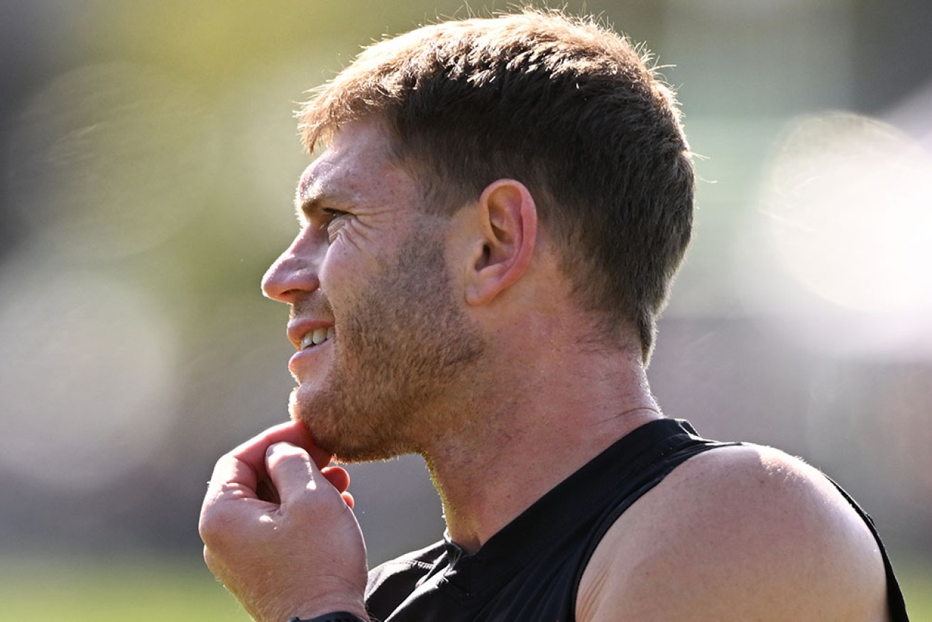 Collingwood's Taylor Adams will miss the AFL grand final after pulling up sore at training.