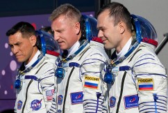 Astronauts return to Earth after a year in space