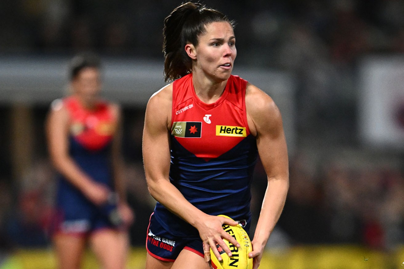 Captain Kate Hore led with four goals for Melbourne in its 49-point AFLW win over Geelong.