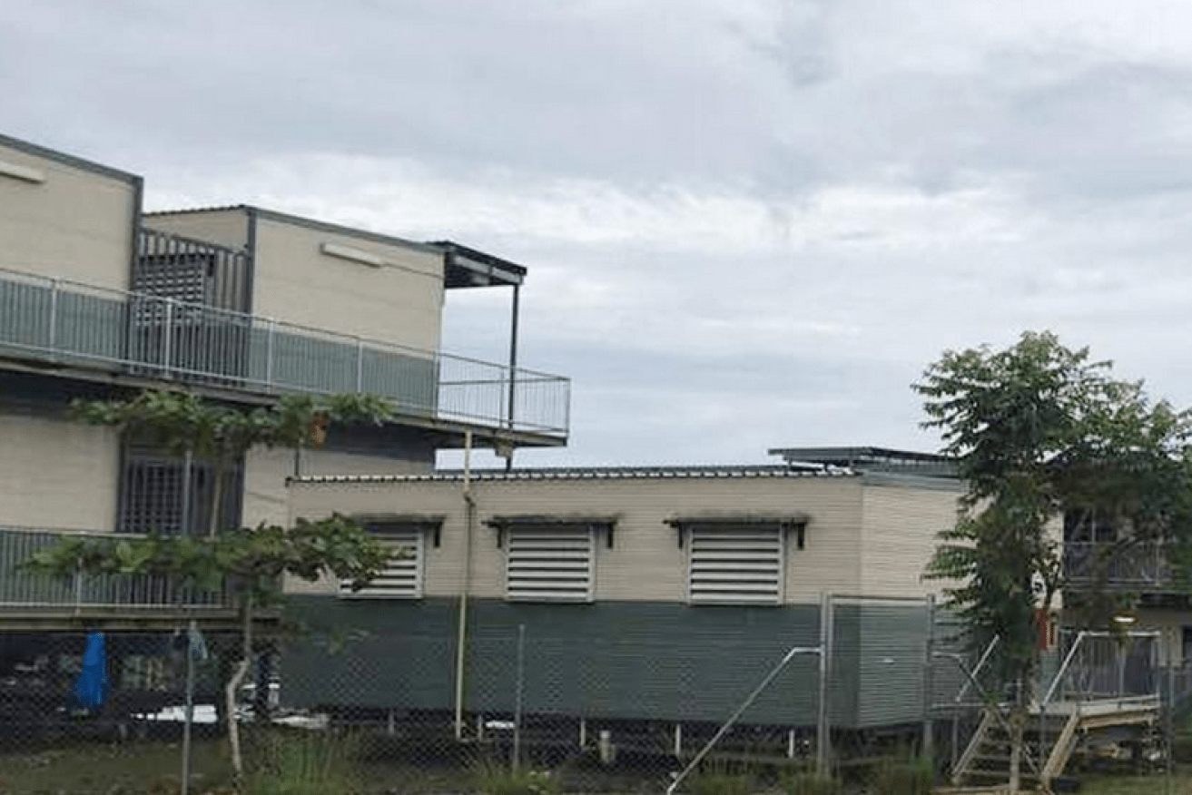Former residents of the closed Manus Island center (above) are living in a state of fear.