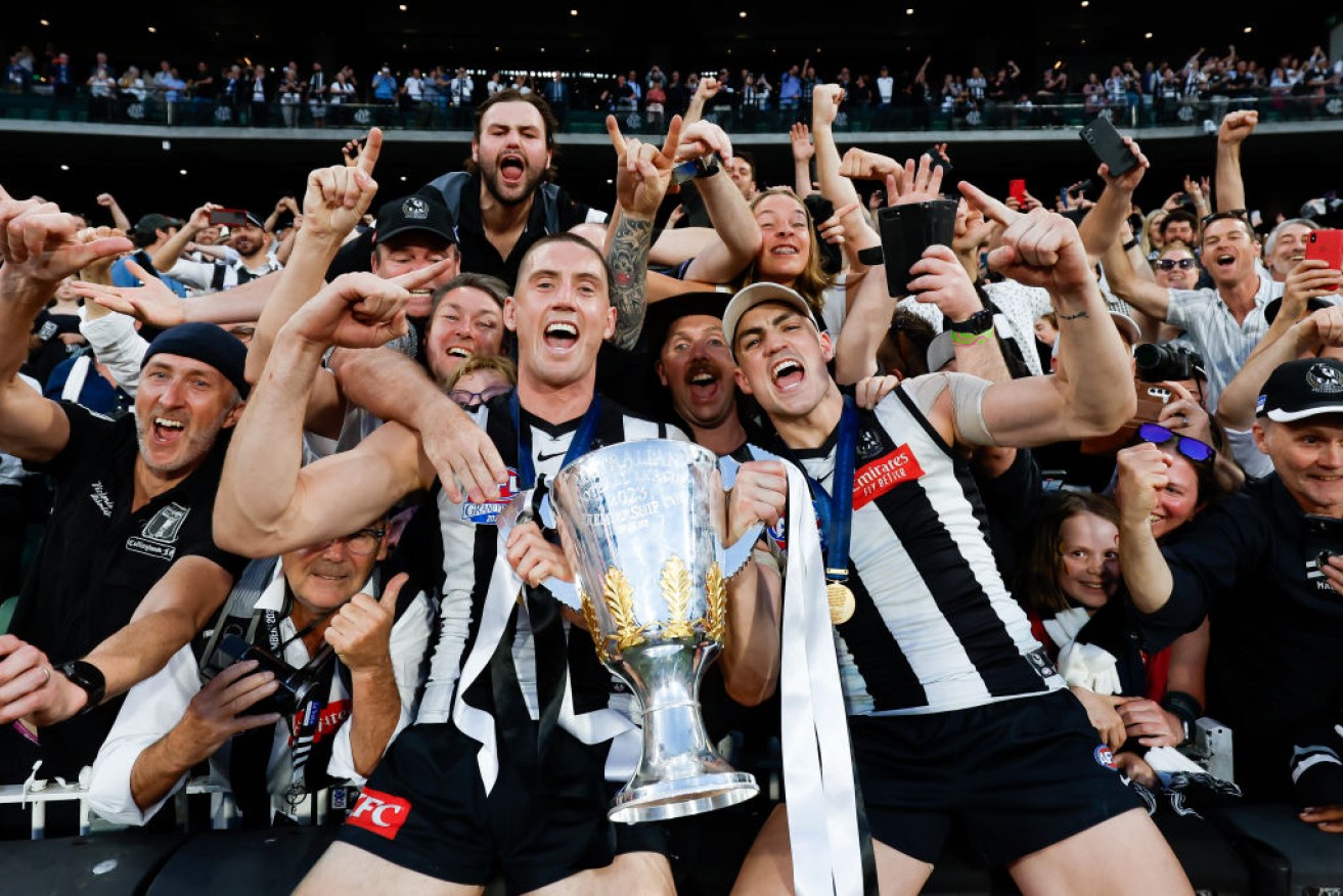 Darcy Cameron and Brayden Maynard celebrate with the Magpie Army at the Melbourne Cricket Ground.