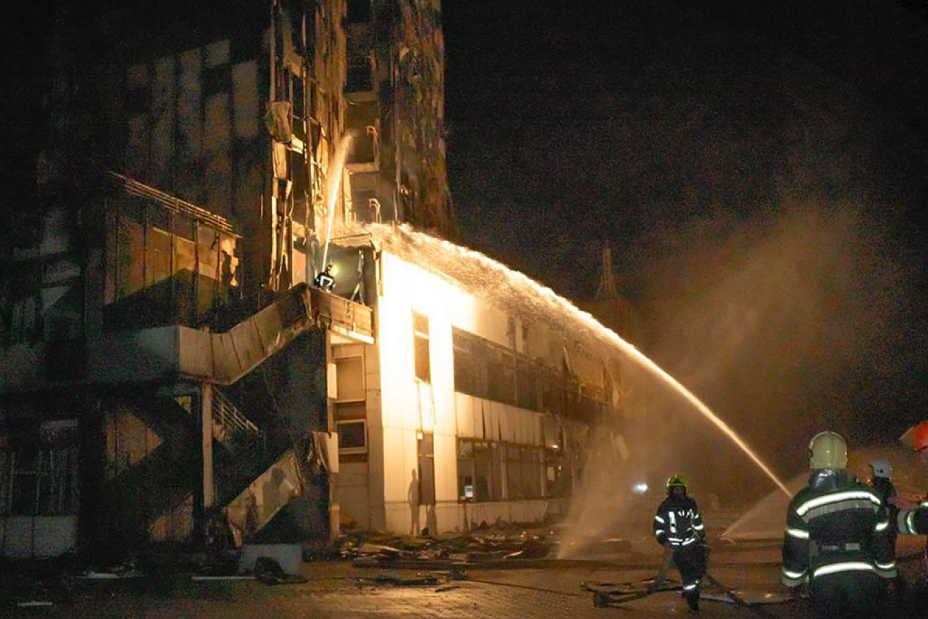 Ukraine firefighters attempt to douse the flames after another Russian blitz on port and grain infrastructure.